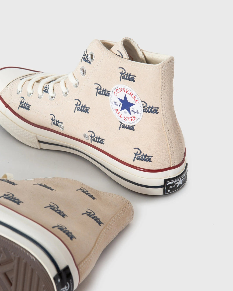 Patta x Converse Chuck 70 Hi in ivory canvas featuring blue allover script logo print and classic ankle patch.